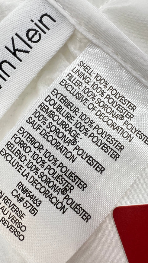 Piumino leggero cartellino