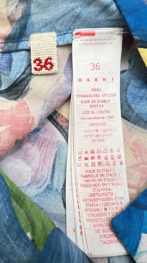 Top smanicato stampato SS23