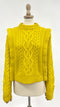 Maglia boxy spallata