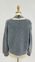 Maglia in lana con bordini