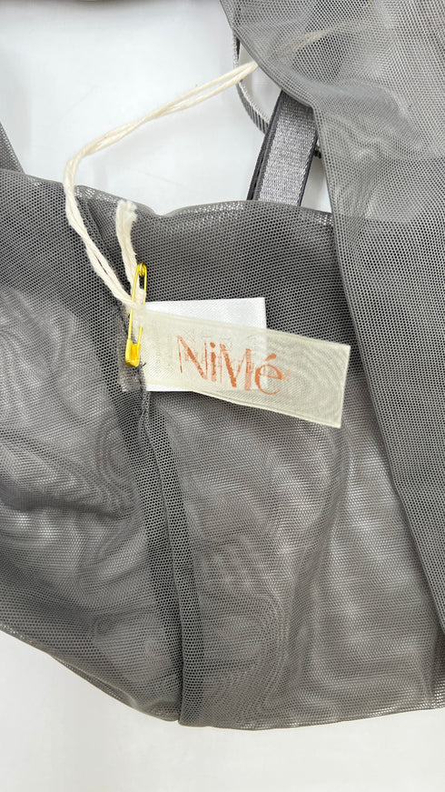 Top in tulle con cartellino