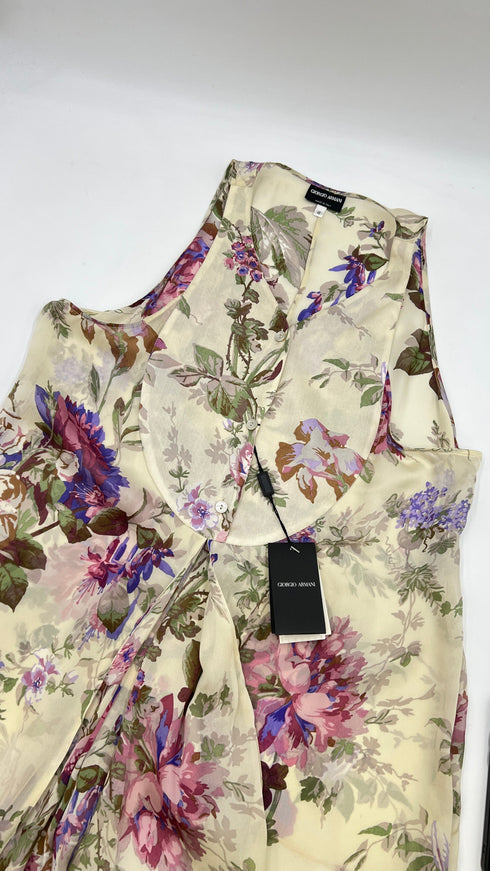 Top in seta a fiori con cartellino