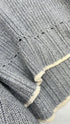 Maglia in lana con bordini