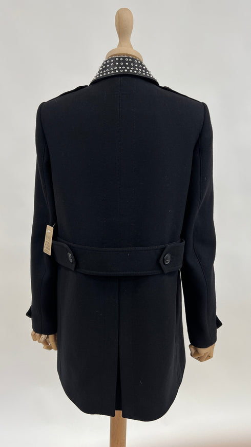 Cappotto pelle e borchie