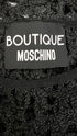 T-shirt traforata con cartellino