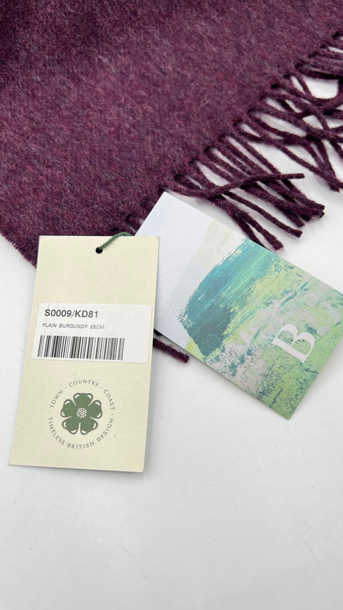 Sciarpa in merino con cartellino