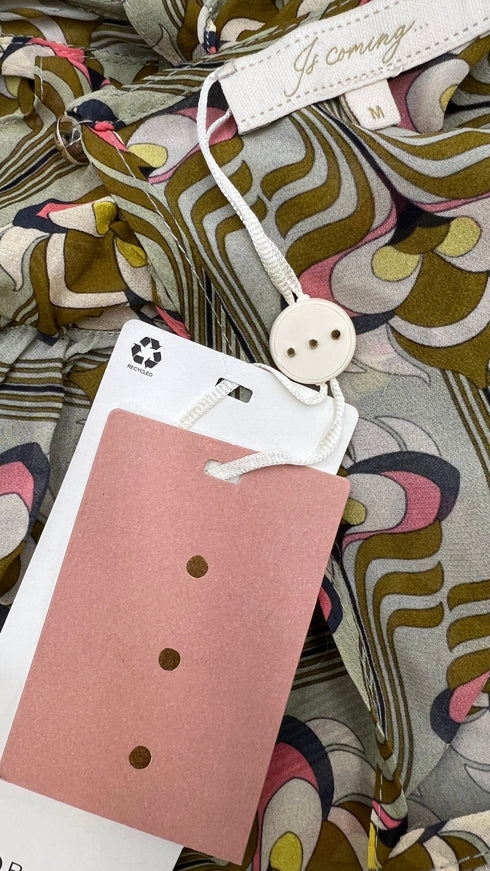 Blusa stampata con cartellino