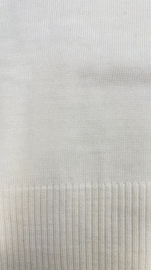 Dolcevita in lana con cartellino