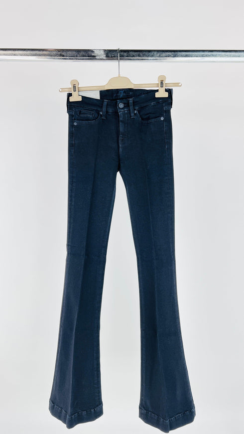 Jeans flare skinny con cartellino