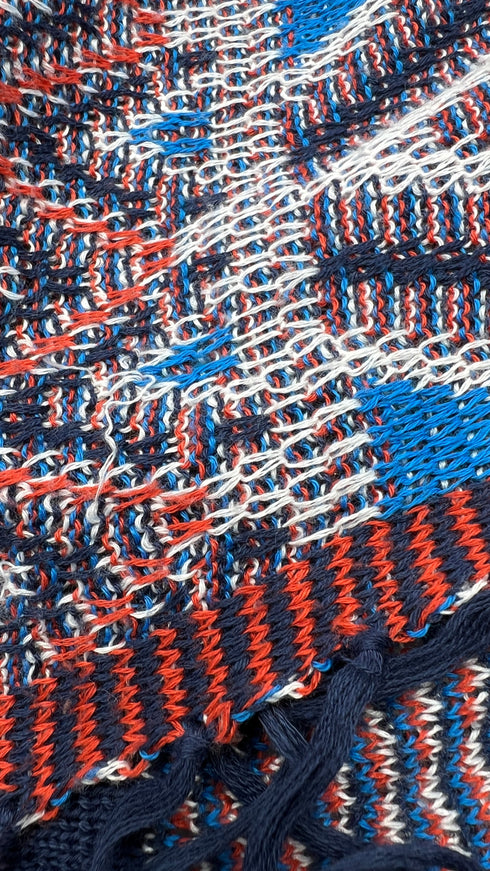 Cardigan sfrangiato con cartellino