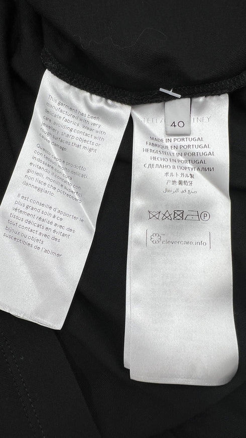 Top nero manica a sbuffo