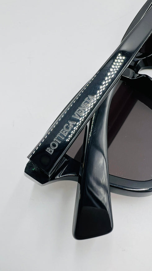 Occhiali da sole neri mini logo