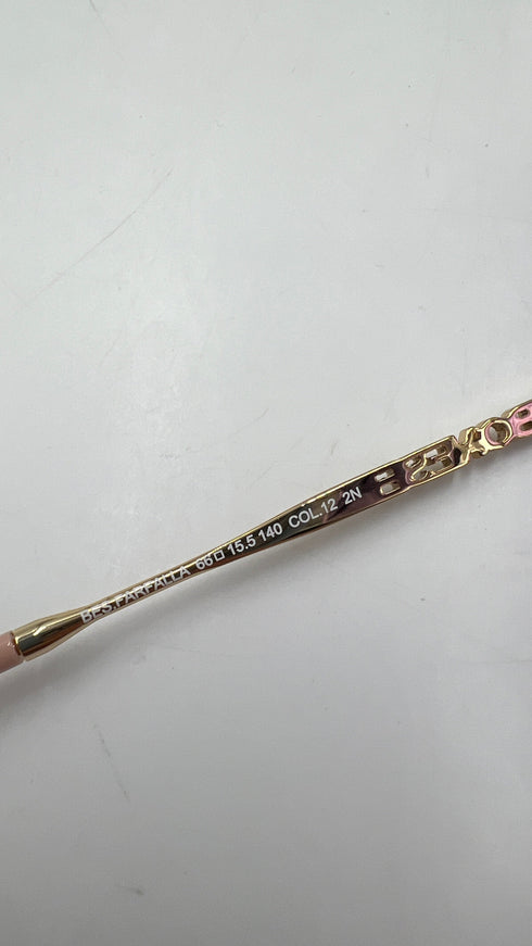 Occhiali da sole a farfalla