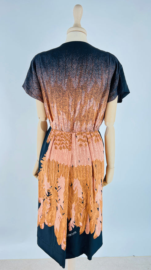 Abito midi fantasia piume