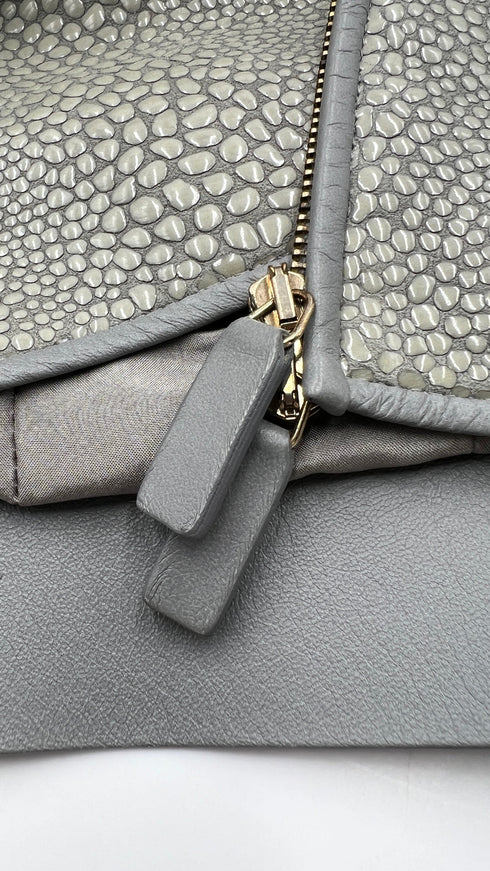 Giacca corta in pelle lavorata