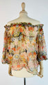 Blusa in seta a fiori