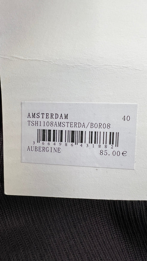 Dolcevita in cotone con cartellino