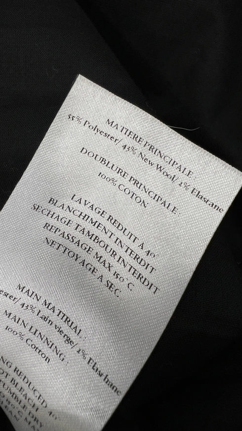 Abito corto gessato con cartellino