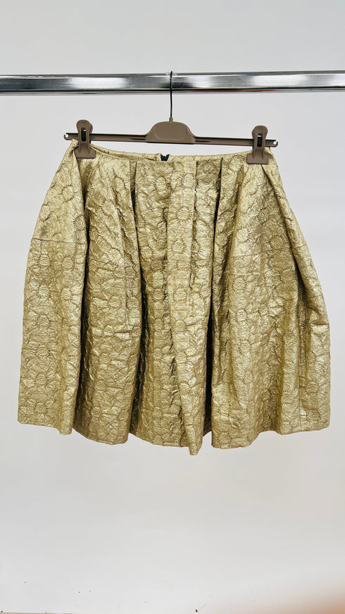 Gonna dorata a ruota