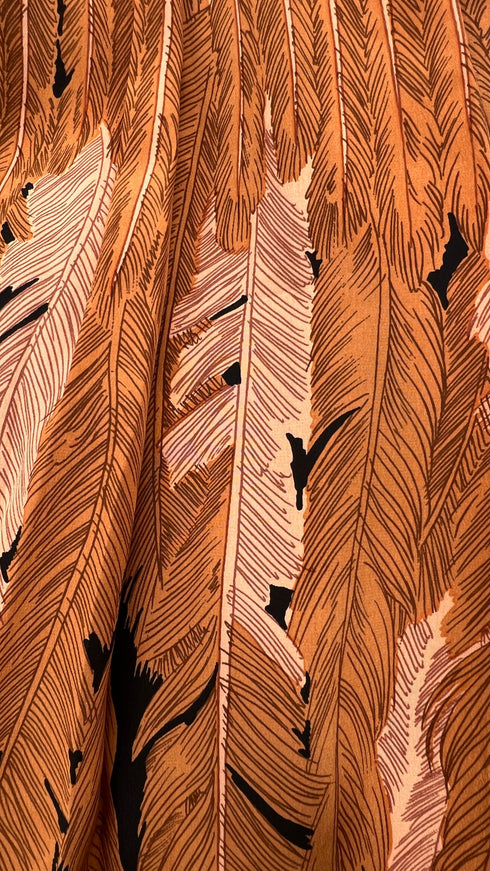 Abito midi fantasia piume