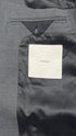 Blazer grigio oversize con cartellino