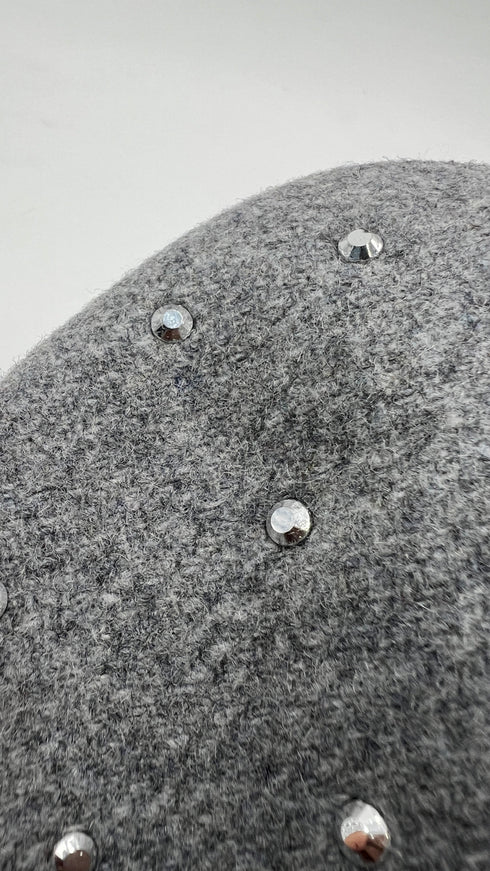 Cappotto con strass e cartellino