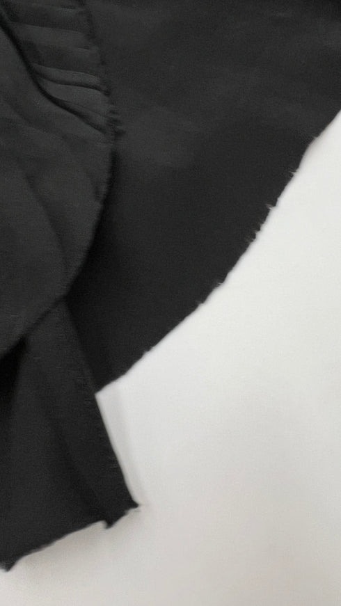 Top in seta a righe diagonali