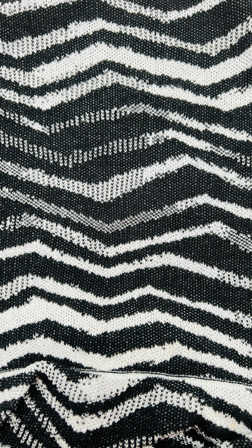 Smanicato in maglia a zig-zag
