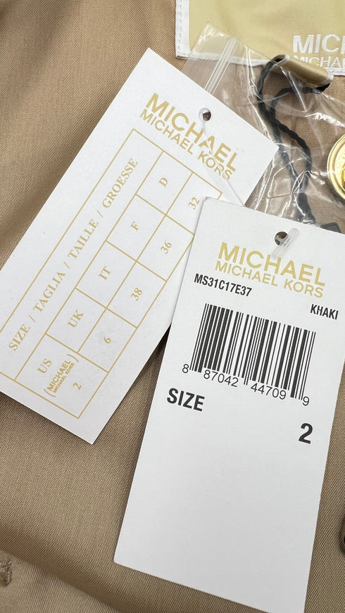 Blazer corto con cartellino