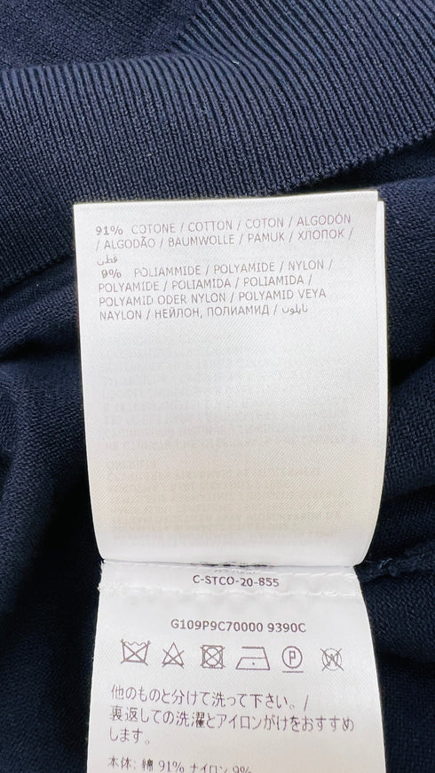 T-shirt blu con cartellino