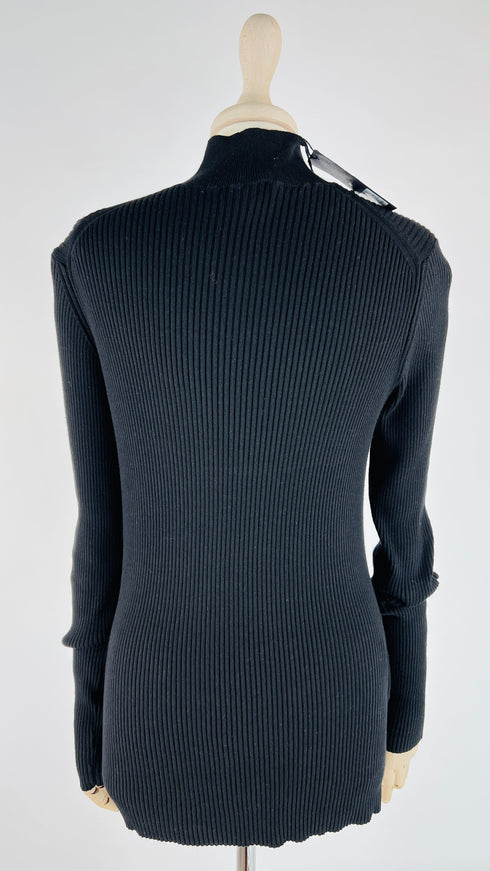 Dolcevita a costine con cartellino