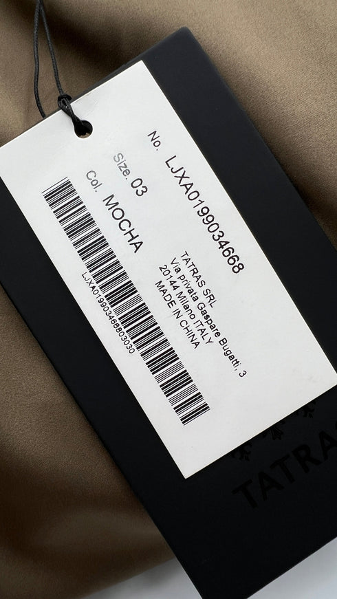 Giacca in eco-pellica con cartellino