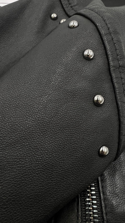 Biker “Tommy” con cartellino