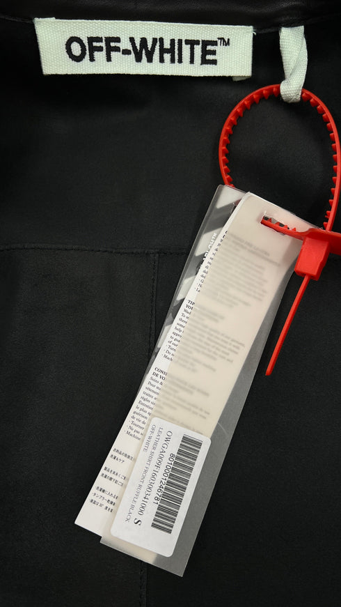 Camicia in pelle con cartellino