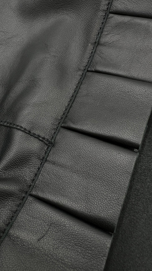 Camicia in pelle con cartellino