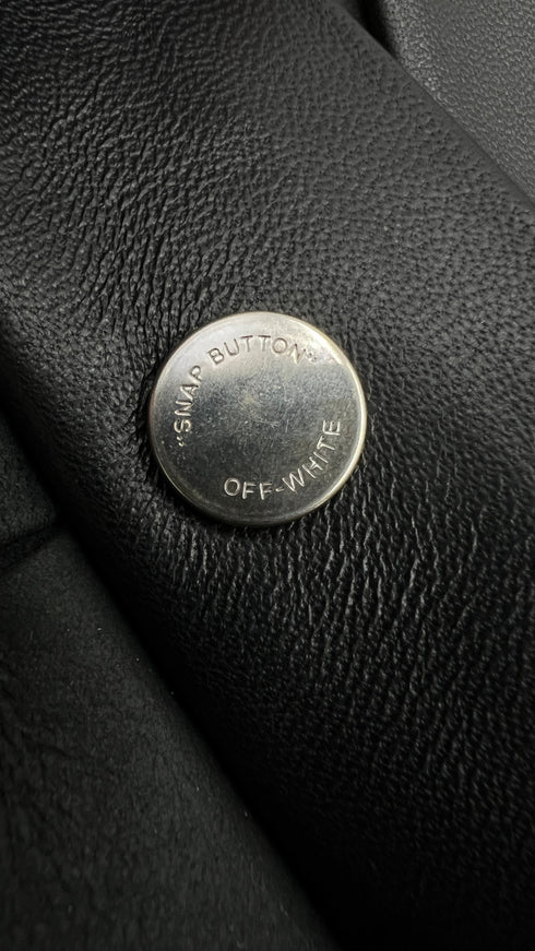 Camicia in pelle con cartellino