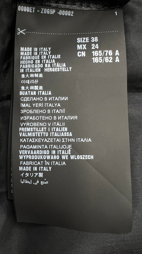 Abito in lana con cartellino