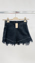 Shorts in denim sfrangiato