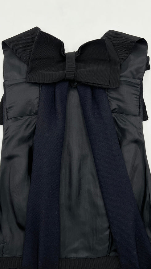 Abito in lana con cartellino