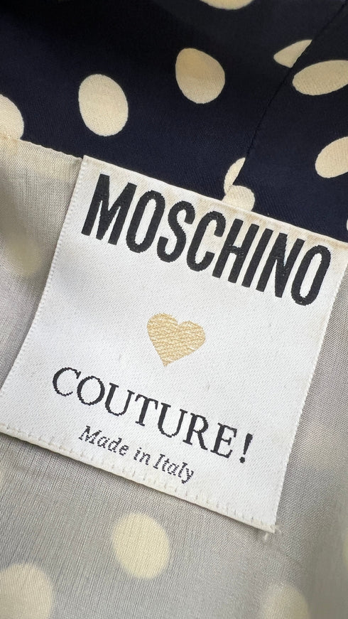 Abito corto a pois con fiocco