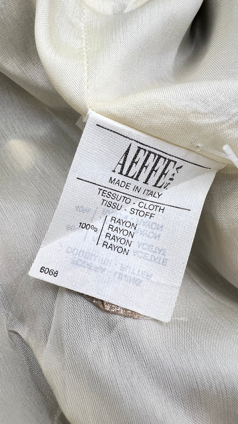 Abito corto a pois con fiocco