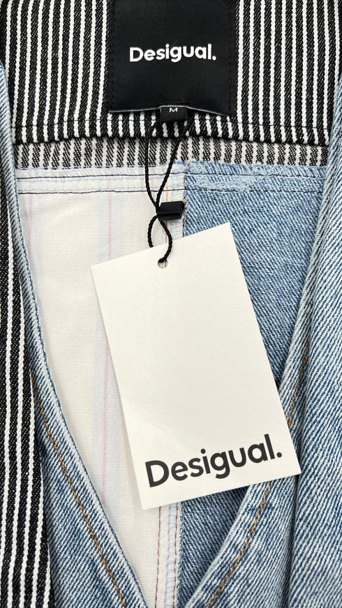 Gilet in denim con cartellino