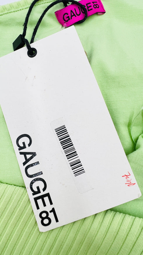 Top monospalla con cartellino