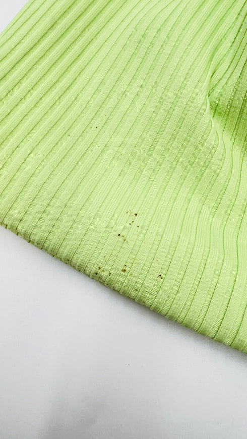 Top monospalla con cartellino