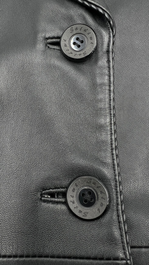 Abito smanicato in pelle