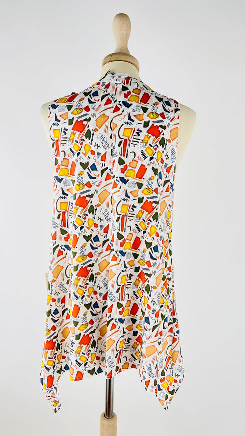 Top con zip e cartellino
