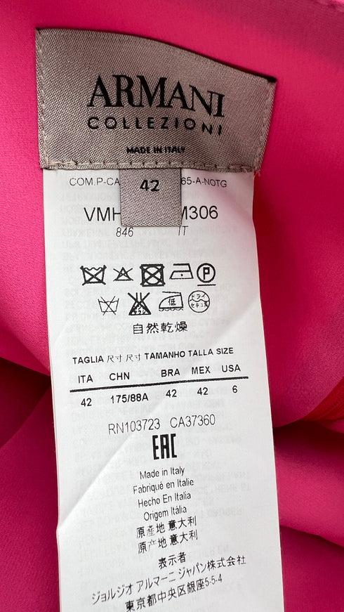 Top elegante con cartellino