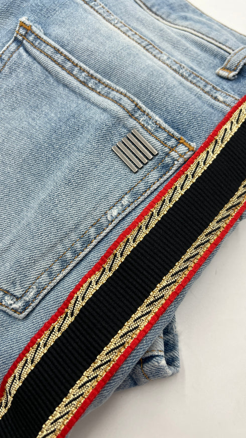 Jeans skinny con passamaneria