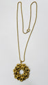 Collana dorata con pendente floreale vintage
