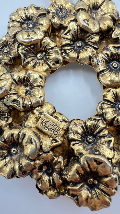 Collana dorata con pendente floreale vintage